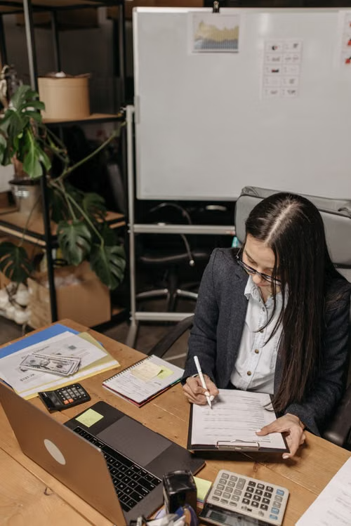 CORSCORE corporate financial advisor working at desk